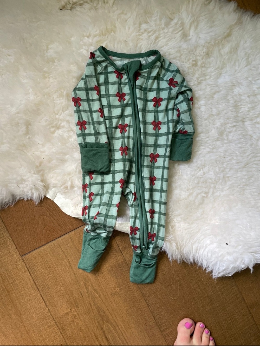 Green Plaid Footed Baby One-Piece with Red Bow Accents